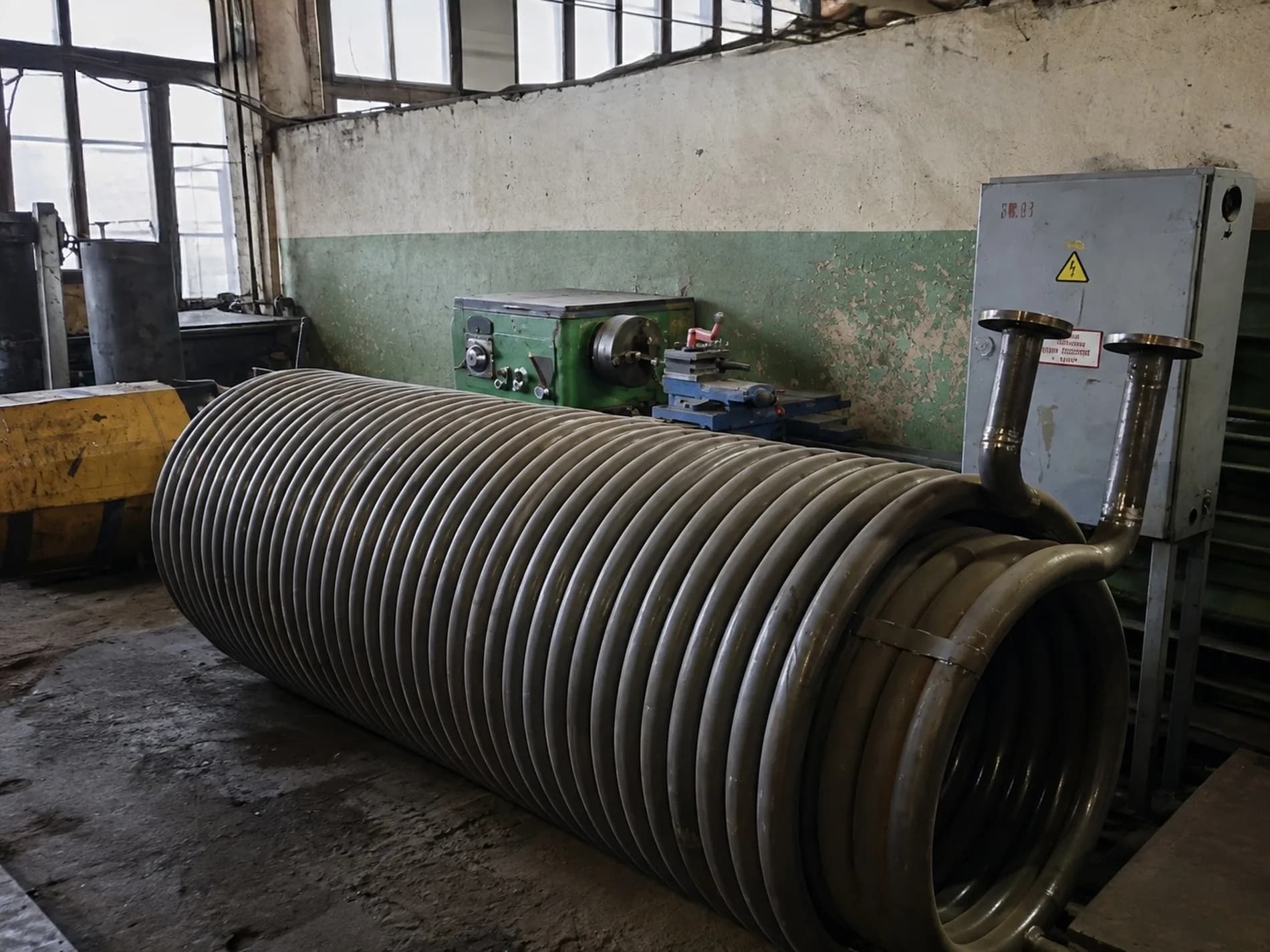 Winding a tube coil on the machine